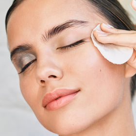 Clarins product in use gently removing mascara without tugging
