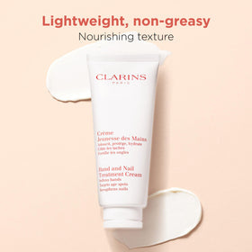 CLARINS tube beside ruler for scale, indicates 3.4 oz travel-friendly size
