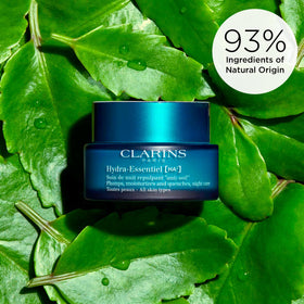 Clarins Hydra‑Essentiel application on neck demonstrating hydration support