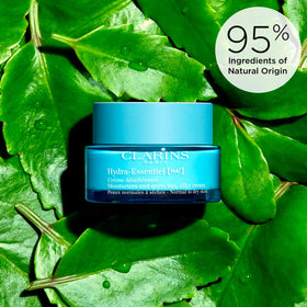 CLARINS cream being applied to skin demonstrating immediate smoothing feel