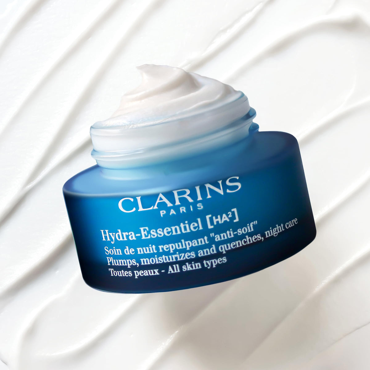 Clarins Hydra‑Essentiel nightly routine flatlay illustrating evening use benefits