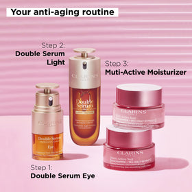 Clarins jar on bathroom shelf in lifestyle setting suggesting daily routine use