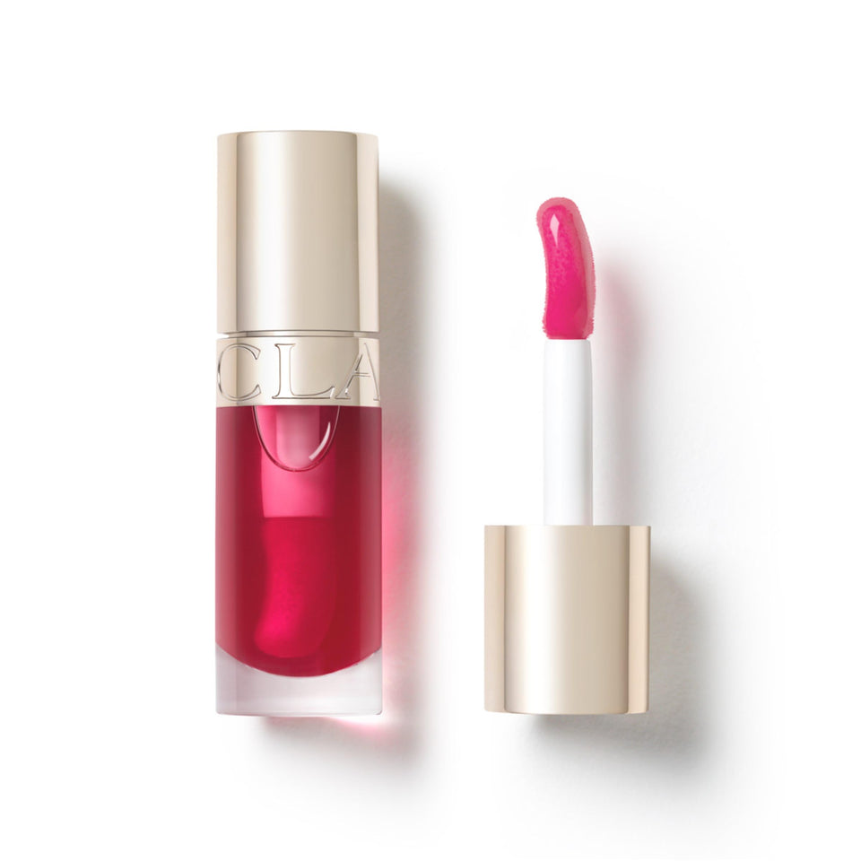 Clarins lip comfort oil front packaging shows glossy tube and brand, hydrates instantly