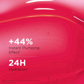CLARINS model applying lip oil demonstrating instant shine and hydration