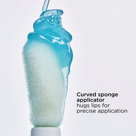 CLARINS lip oil on bathroom counter in lifestyle scene for daily use appeal