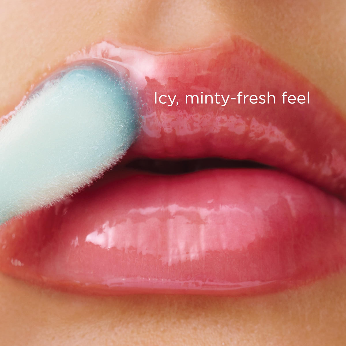 CLARINS lip oil applied on lips close-up for visible glossy, plumping effect