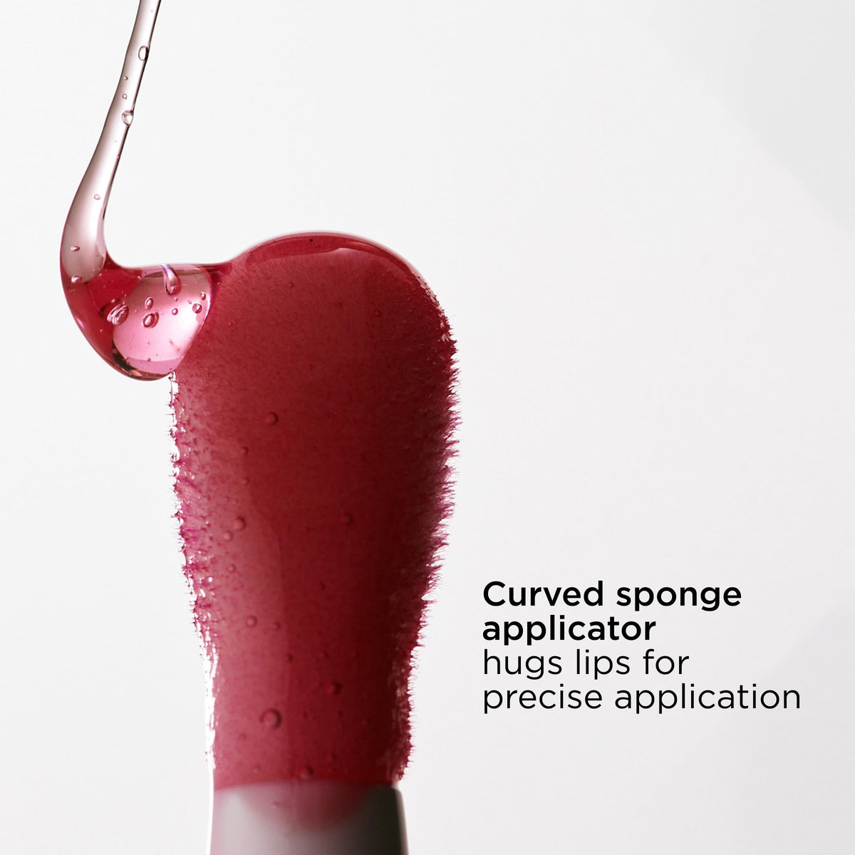 Clarins product held in hand for scale and easy on-the-go appeal