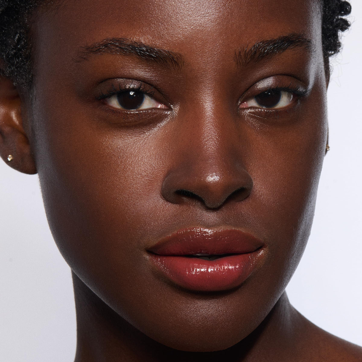 Clarins lip oil balm closeup of plant oil ingredients highlighting nourishing benefits