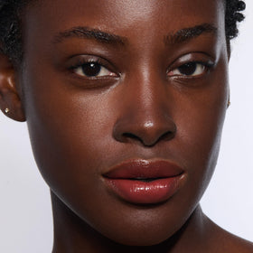 Clarins lip oil balm closeup of plant oil ingredients highlighting nourishing benefits