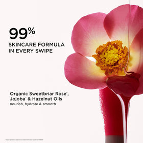 Clarins lip oil bottle label detail emphasizing natural-origin ingredients benefit