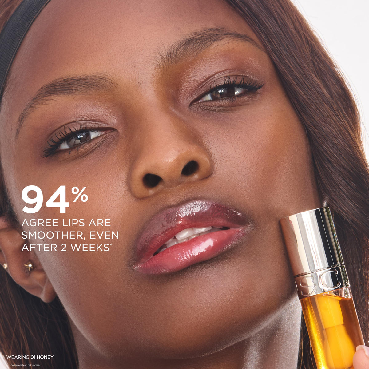 Clarins lip oil staged bedside showing overnight treatment comfort benefit