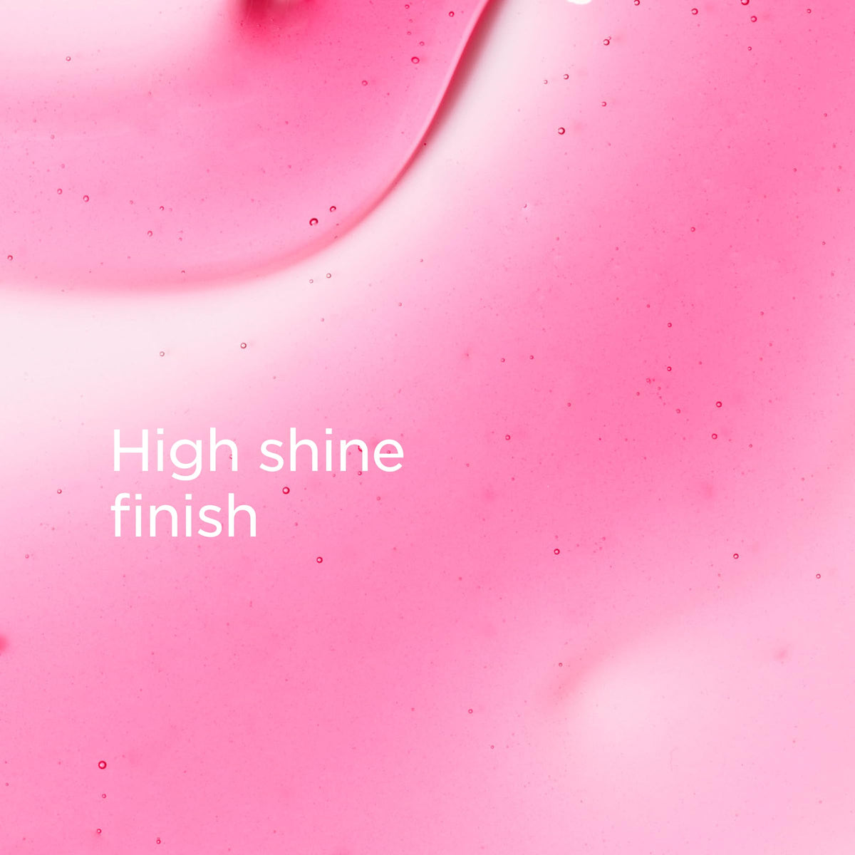 Clarins lip oil texture closeup depicting silky hydration and shine