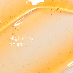 Clarins lip oil texture swirl highlighting rich emollient formula benefit