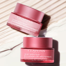 CLARINS applying moisturizer to face showing smoothing and pore-refining benefit