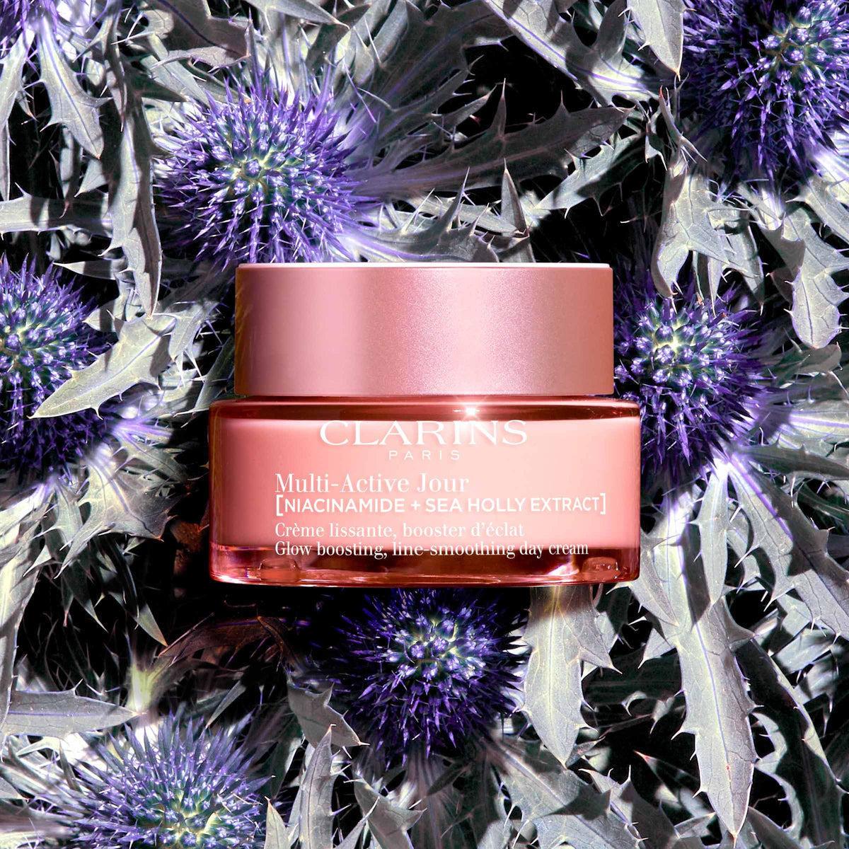 CLARINS cream on hand demonstrating rich emollient and quick absorption benefit
