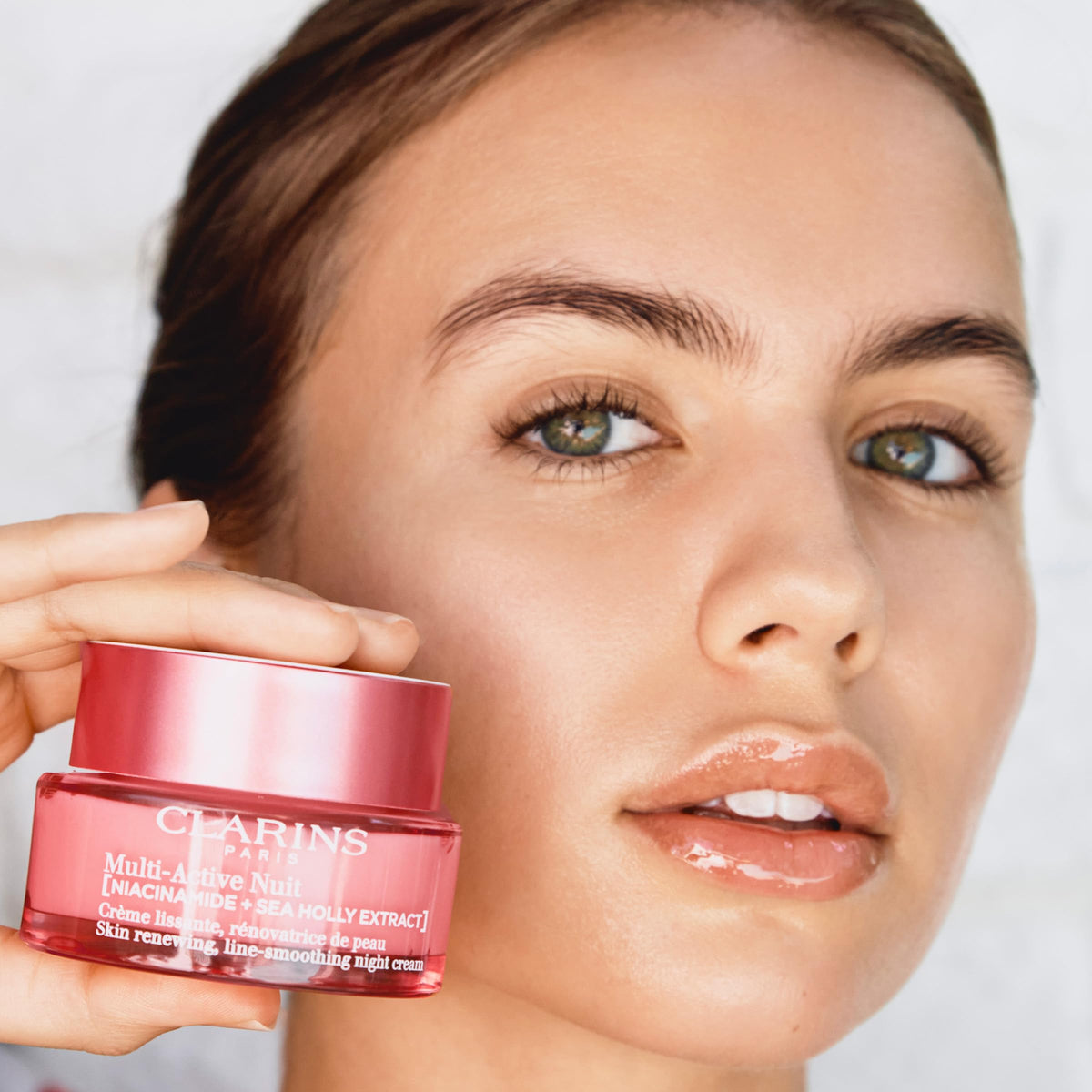 Clarins product staged on bedside table for calm nighttime routine benefit