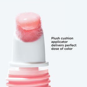 Clarins product staged in handbag setting for on-the-go hydration