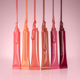 Clarins gloss layered over lipstick demonstrating added shine and smoothing benefit