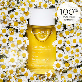 Clarins applied during massage demonstrating muscle-soothing benefit