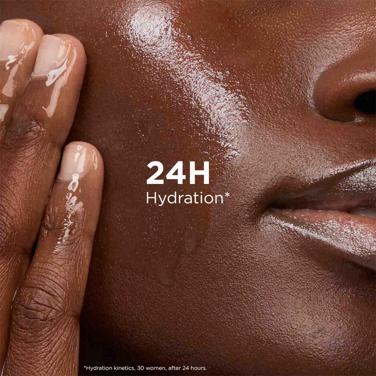 Clarins hand applying serum illustrating smooth spread and quick skin feel