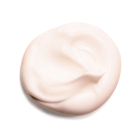 Clarins hand cream texture close-up showing rich nourishing butter