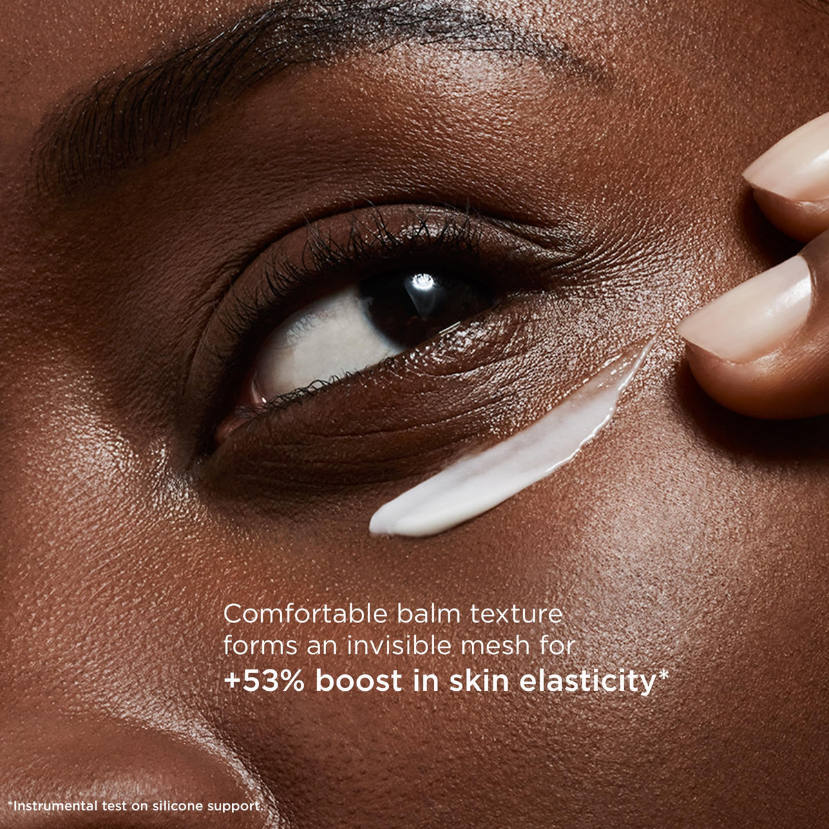CLARINS product held in hand for scale showing compact travel‑friendly size