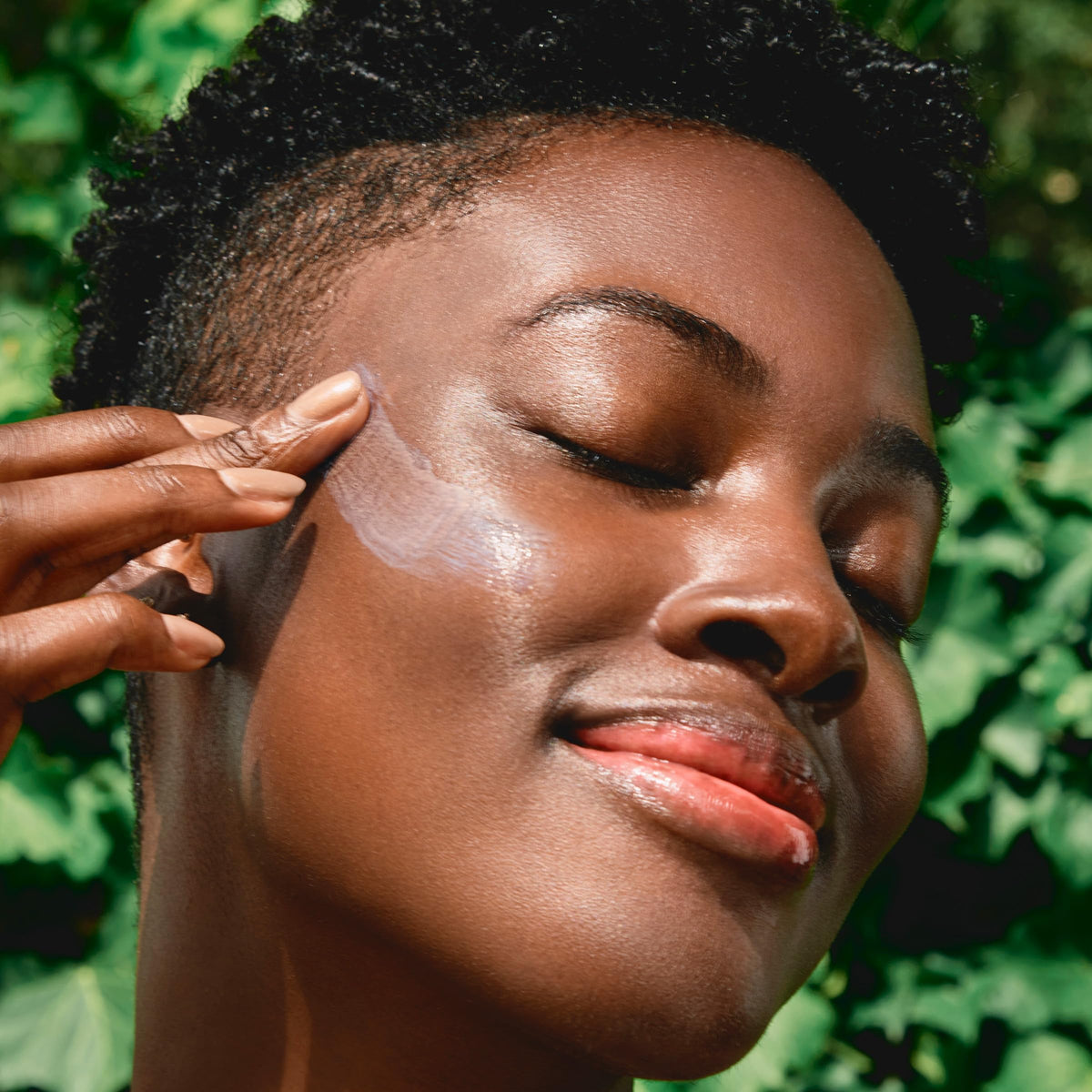 Clarins sunscreen texture close-up displaying lightweight finish and quick absorption benefit