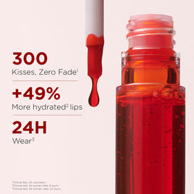 Clarins lip stain held in hand to show compact travel-friendly size
