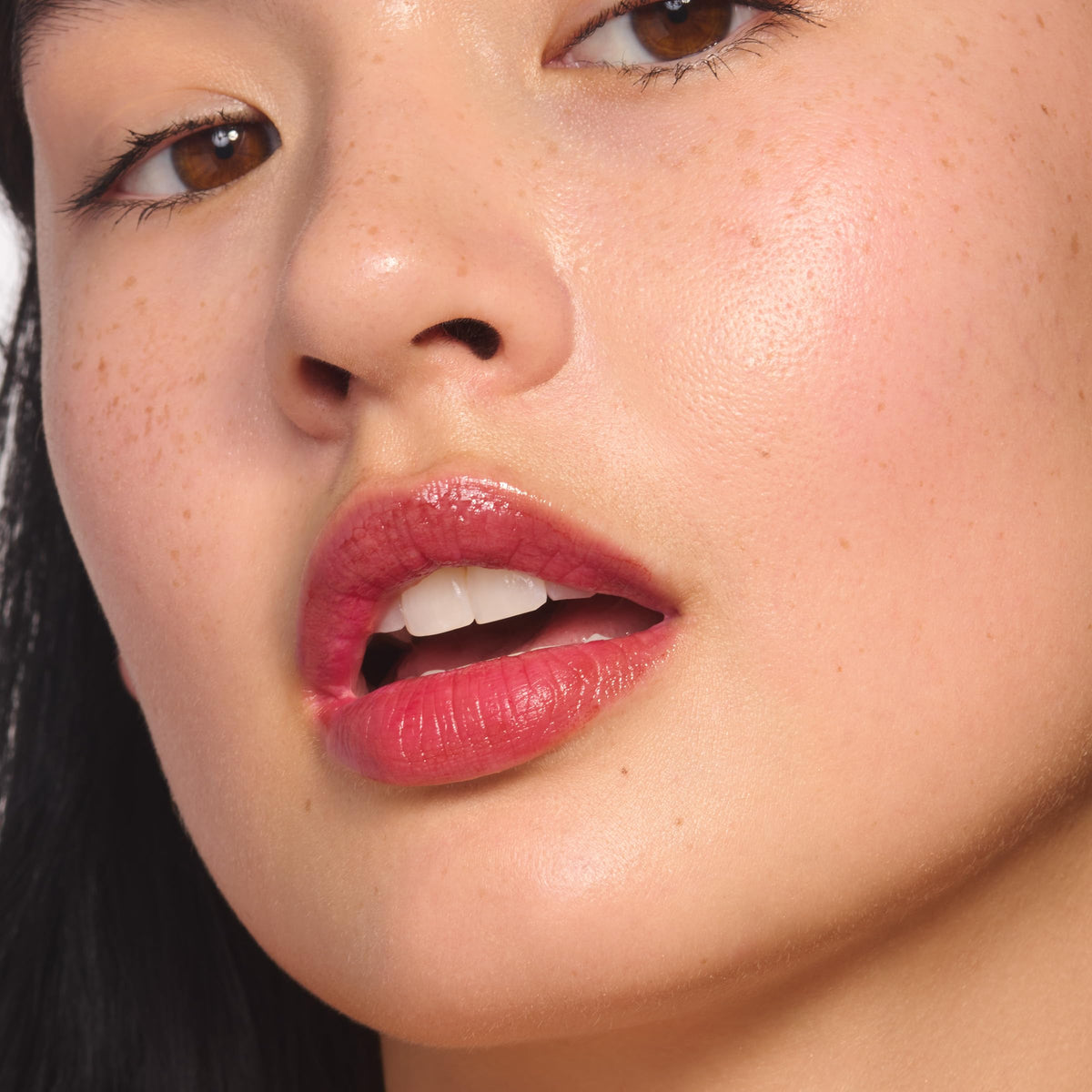 Clarins Water Lip Stain applied on lips in 13 Nude Water showing natural matte look benefit