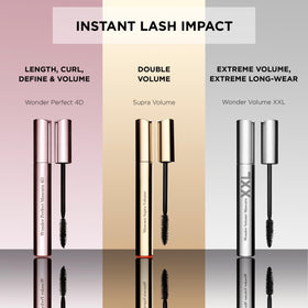 Clarins model applying mascara in natural setting for real-life results