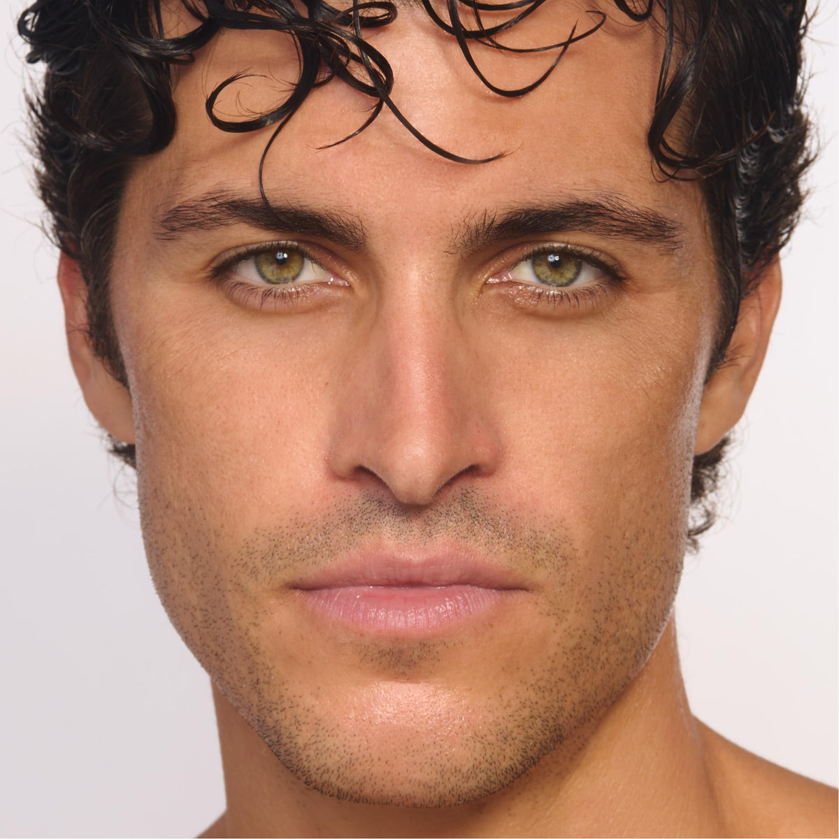 CLARINSMEN applied along neck and jawline to demonstrate lifting benefit
