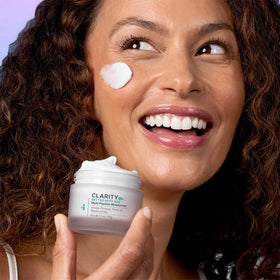ClarityRx cream on hand demonstrating easy spread and skin absorption