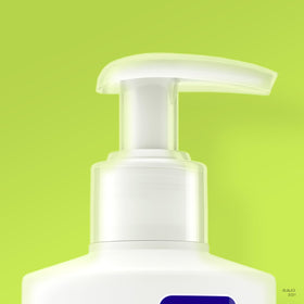 Clean & Clear size comparison beside common toiletries for scale
