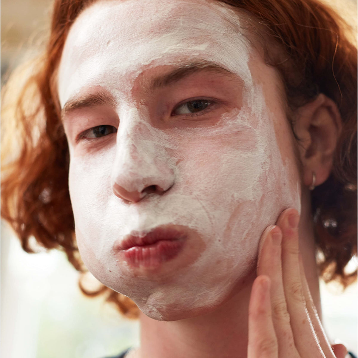 Clean & Clear scrub being applied on hand demonstrating gentle action benefit