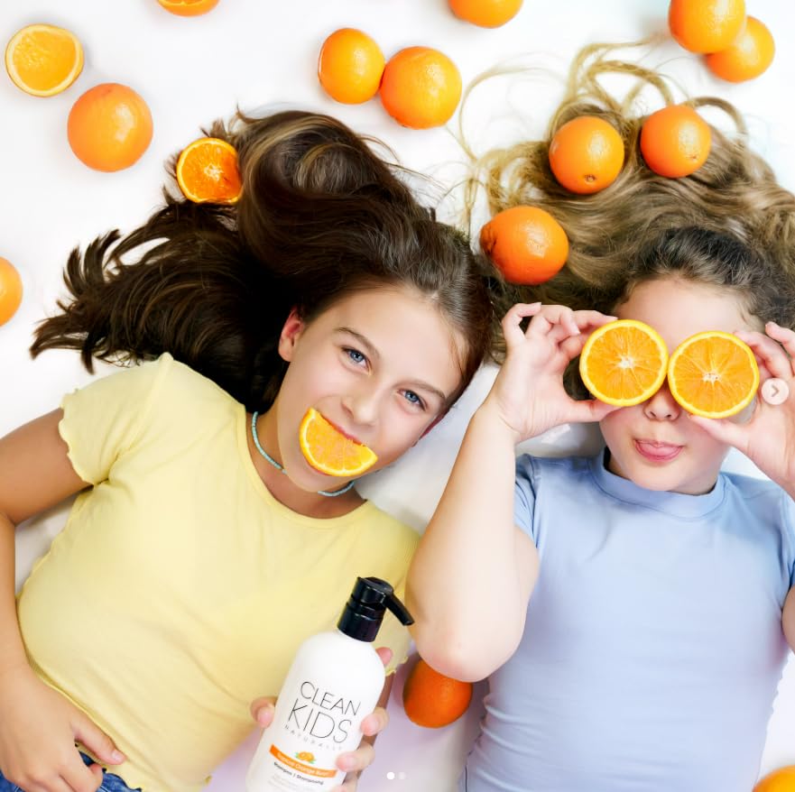 Child using Clean Kids Naturally in bath demonstrating gentle, tear-free application