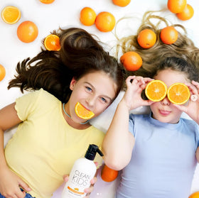 Child using Clean Kids Naturally in bath demonstrating gentle, tear-free application
