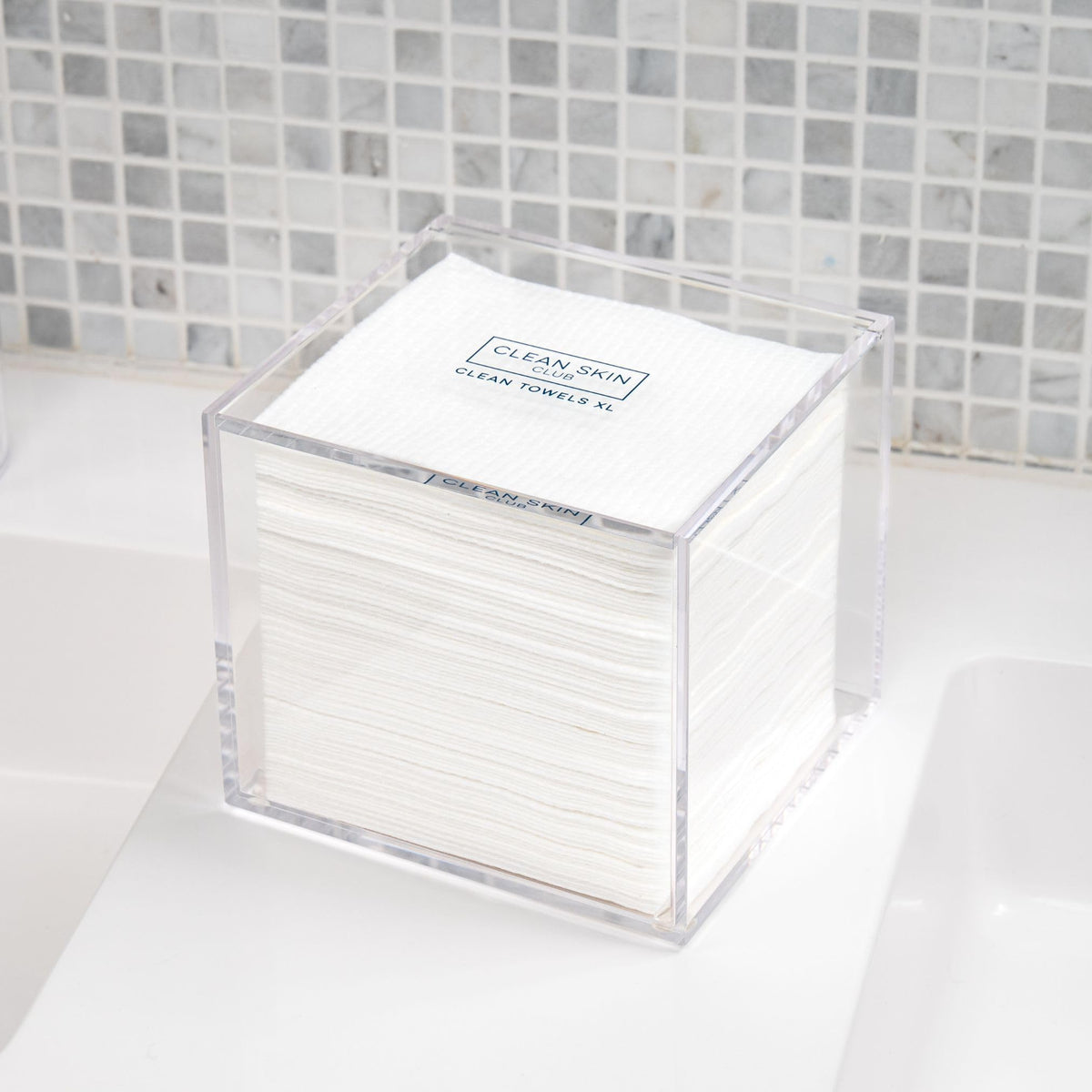CLEAN SKIN CLUB box arranged on shelf demonstrating space-saving styling benefit