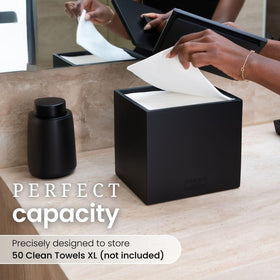 CLEAN SKIN CLUB lid open with refill illustrates easy access and organized towel dispensing