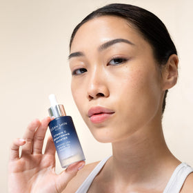 CLEAN SKIN CLUB lifestyle portrait showing glowing skin after use