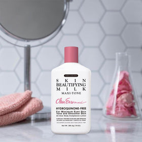 Clear Essence bottle on bathroom shelf in lifestyle setting suggesting daily use