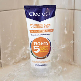 Close view of key ingredients on Clearasil label highlighting acne-targeting action