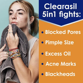 Clearasil pad held in hand for size comparison and portability benefit