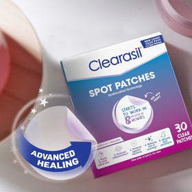 Clearasil patch beside coin showing size and placement clarity