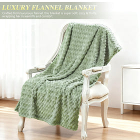 Clexela green throw blanket folded to show soft texture and cozy warmth
