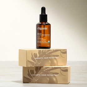 Cliganic argan oil on bathroom shelf in lifestyle setting for daily use