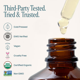 Hand holding Cliganic bottle to show size and travel-friendly convenience benefit