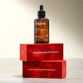Cliganic jojoba oil on bathroom counter in lifestyle setting for daily routine
