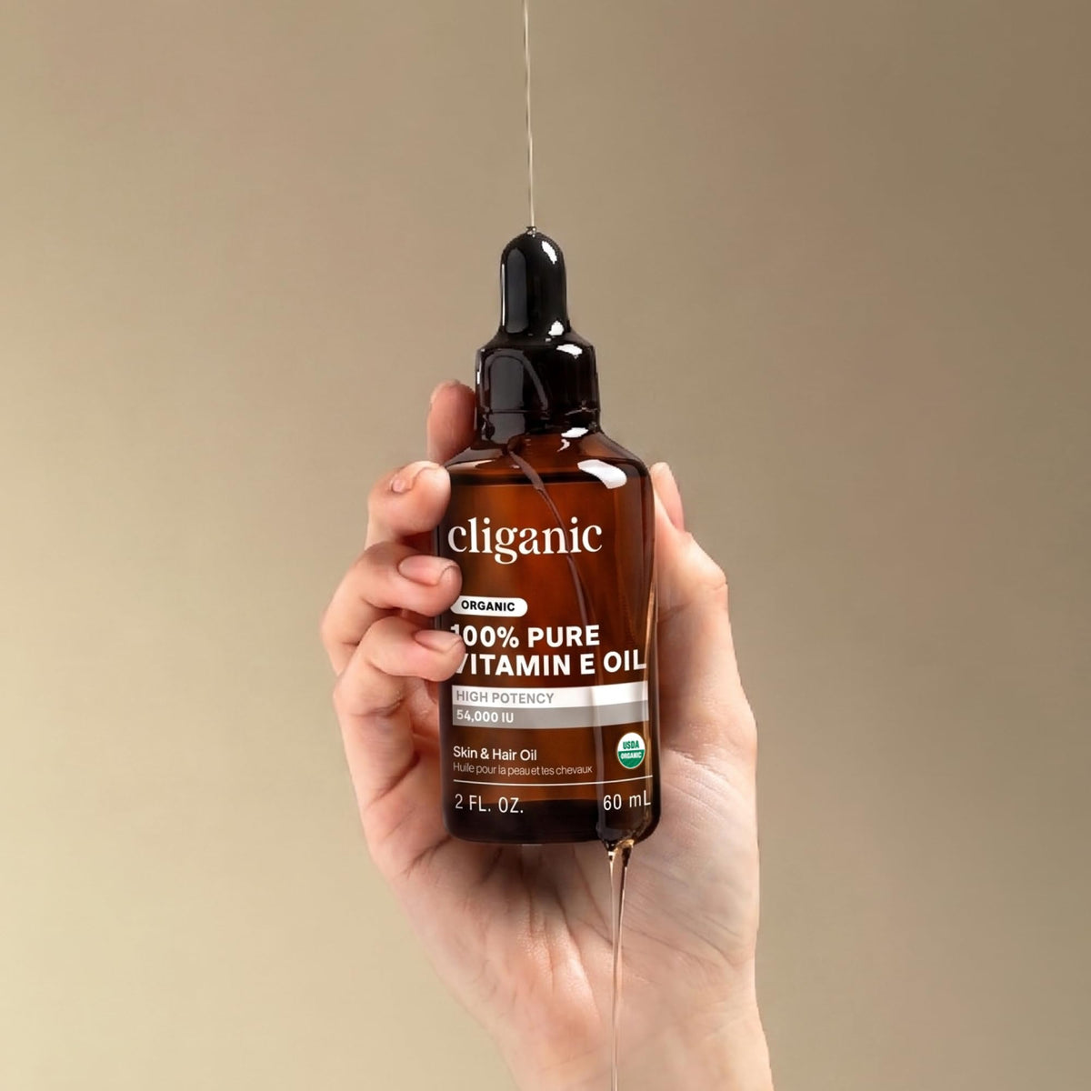 Cliganic oil on bedside table within nighttime routine showing calming nourishing benefit