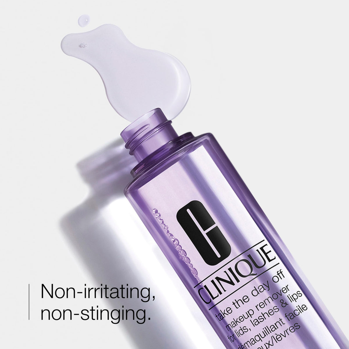 Clinique remover applied to a cotton pad on closed eye showing gentle removal benefit