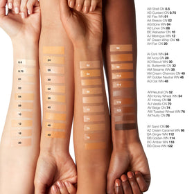 Clinique in-use application by mirror showing natural finish and quick blending benefit